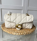 Cream Coach Bag